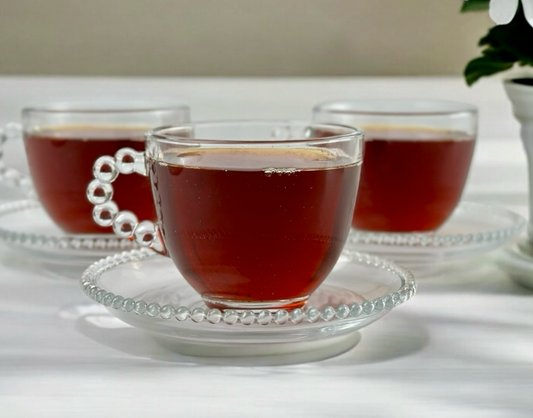 مجموعة من ست أكواب للشاي مع الصحون